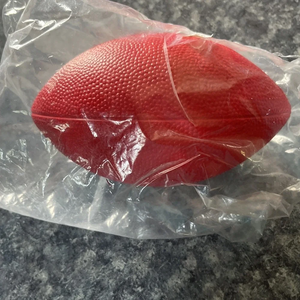 2 Collectible Coca Cola Mini Footballs. (1-leather, 1- foam) approx. 7 inches